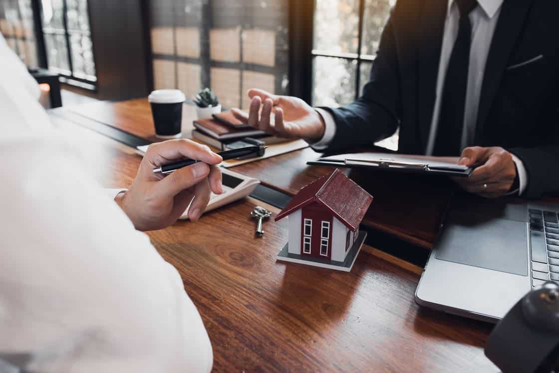 business people making agreement with pen