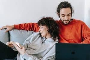 Landlord-Tenant-CV-Finding-the-right-tenant-couple-lounge-laptop-pexels-blue-bird