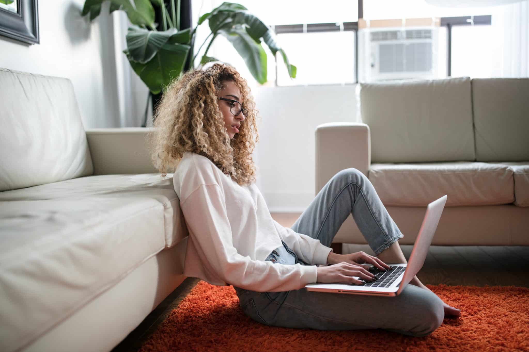 Person in the living room with computer